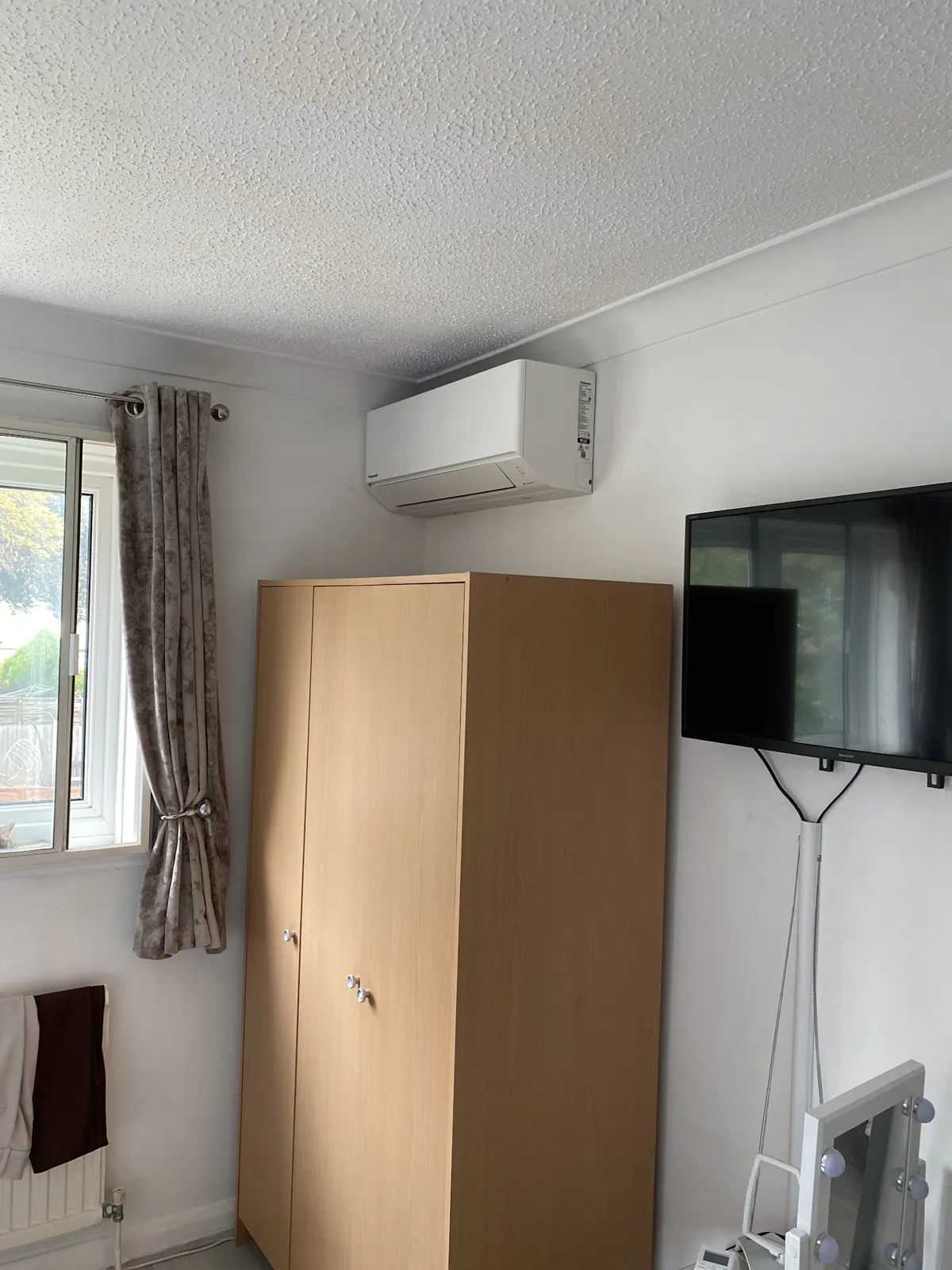 Bedroom: air conditioning installed by Urban Heating & Cooling, Essex